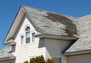 Roof repair after storm damage in Evergreen